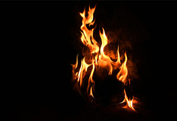 Fototapeta premium Various fire energy patterns that are burning on a black background.