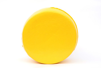 Big cheese head in yellow vacuum package. Cheese wheel isolated on white background. Packaging template mockup collection. With clipping Path included. Front view