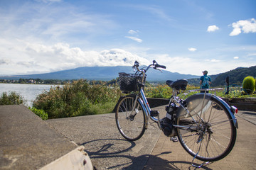Fototapeta premium The bicycle in Kawaguchiko Natural Living Center with Mt.Fuji back ground. Kawaguchiko Japan.
