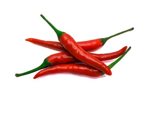 Group oof four Red Hot chili peppers isolated on white background