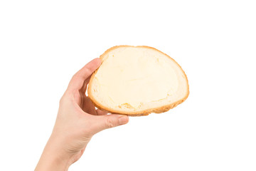 Bread and butter in woman hand isolated on white background.