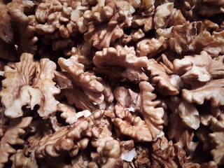 Peeled / shelled walnuts. Closeup / macro photography. Walnuts are a great source of high concentrations of fat, vitamin B, zinc,