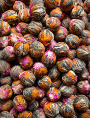 Background of tea balls with jasmine flowers