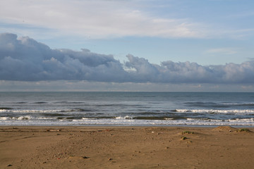 View of the ocean and clouds at the beach