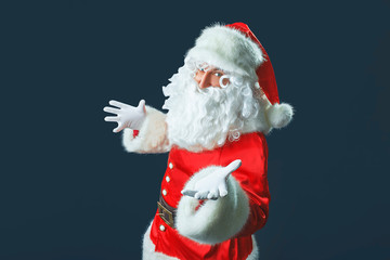 Funny Santa Claus on a dark background.