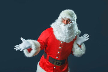 Funny Santa Claus on a dark background.