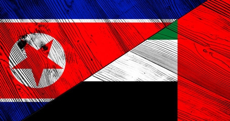 Flag of North Korea and United Arab Emirates on wooden boards