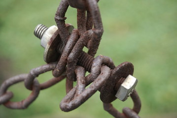 old chain connected by bolt