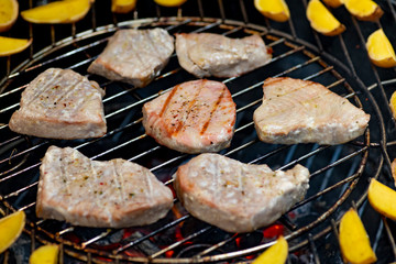 grilled tuna with potatoes on garden grill