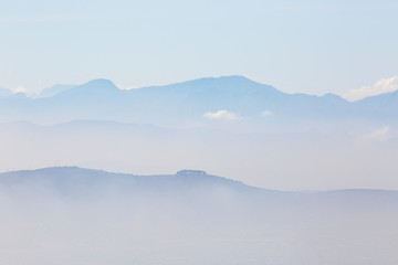 Blue foggy / cloudy mountains / hills near Cape Town, South Africa