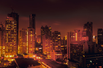 Naklejka na ściany i meble Bangkok night view with skyscraper in business district in Bangkok Thailand