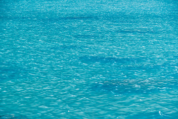 Turquoise color of river water. Blue sea, ocean for with waves