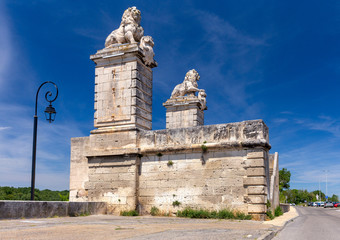 Arles. Stone stairs and sculptures of the old destroyed bridge.