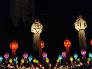 Fototapeta na wymiar Colorful lantern lights during loy krathong and yeepeng festival in Thailand.