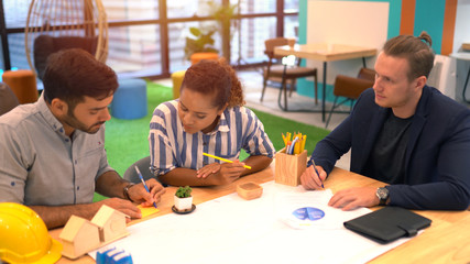 Group of young architect meeting at office