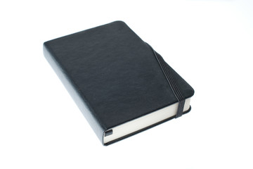 black notebook with rubber closure