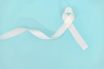 lung cancer awareness month with white ribbon. Healthcare and medicine concept.