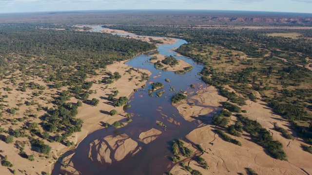 Aerial View Flying Up A River In Gonarezhou National Park, Zimbabwe