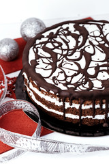 Chocolate cake with white cream, new year, christmas concept. Vertical photo.