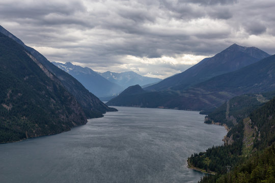 Aerial View of Anderson Lake surrounded by Canadian Mountain Landscape during a cloudy summer day. Located near Lillooet, BC, Canada. © edb3_16