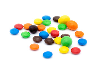 Colorful Candies isolated on white Background, chocolate coated Candies