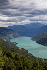 Beautiful View from Above of Seton Lake surrounded by Canadian Mountain Landscape during a summer day. Taken in Shalalth near Lillooet, BC, Canada.
