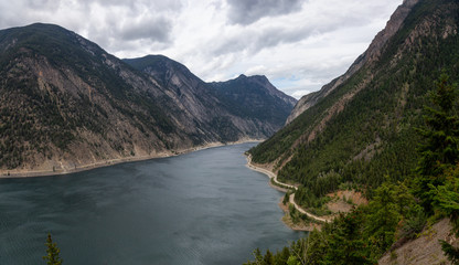 Obraz na płótnie Canvas Beautiful Panoramic Aerial View of Carpenter Lake during a cloudy summer day. Located between Gold Bridge and Lillooet in the interior British Columbia, Canada.