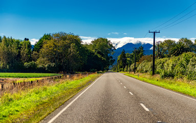 Fototapeta na wymiar Road with a view of the New Zealand Alps