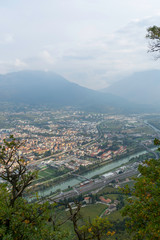 View over the city of Trento, Hills in the Background, Clouds and rainy weather,