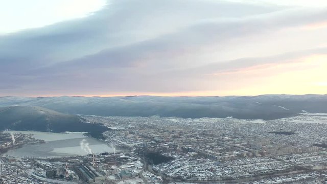 Sunrise in winter in the city of Beloretsk