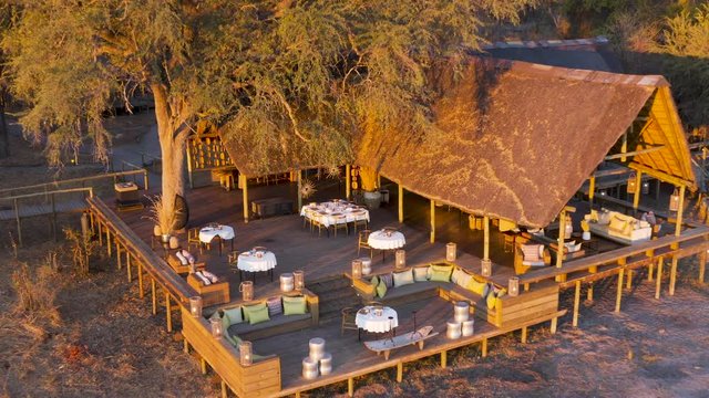 Aerial zoom out view of Sable Alley Safari Camp, Okavango Delta, Botswana