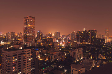 Naklejka premium Bangkok night view with skyscraper in business district in Bangkok Thailand