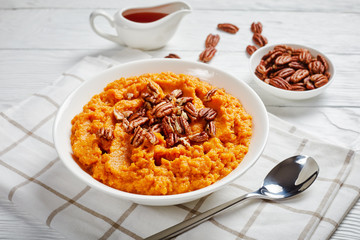 mashed sweet potato topped with pecan nuts