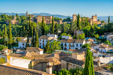 Panoramic sight of the Alhambra Palace and the Albaicin district in Granada. Andalusia, Spain. - obrazy, fototapety, plakaty
