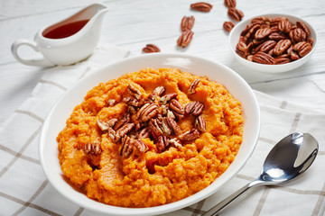 mashed sweet potato topped with pecan nuts