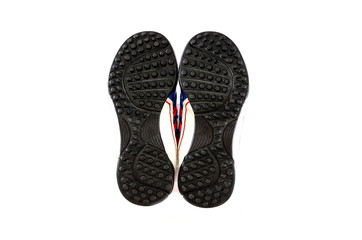 soccer shoes sole isolated on white background. Spikes on the sole.