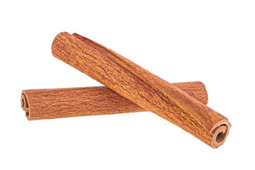 Two sticks of cinnamon isolated on a white background. Full depth of field.