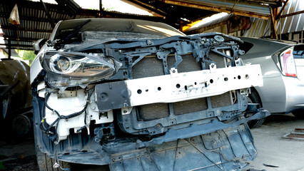 The old broken car in garage for waiting repair