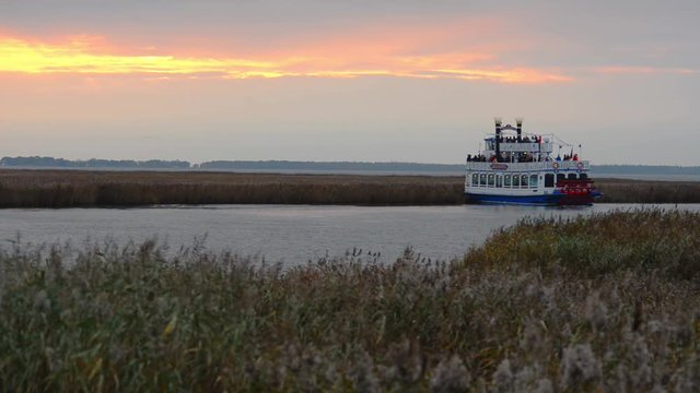 Bird watching on a tourist boat on the Dar&szlig; peninsula in northern Germany