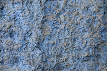 Texture of stucco used as an exterior coating on a building