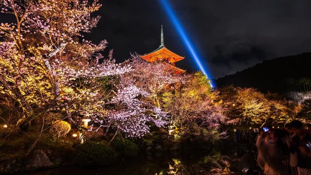 People visiting Kiyomizu dera Temple in Kyoto at night time lapse