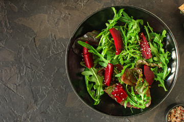salad beetroot, leaf mix (beet, lettuce, arugula, red chard and more) menu concept. food background. top view. copy space