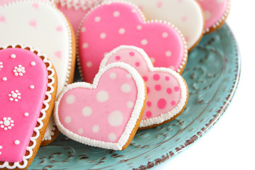 Set of pink heart shaped cookies with patterns, handmade