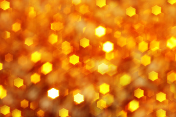 Christmas background and new year concept, abstract blurred golden background with bokeh stars and blur. Winter banner for your text, background image 