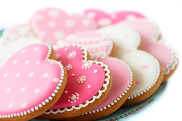Set of pink heart shaped cookies with patterns, handmade