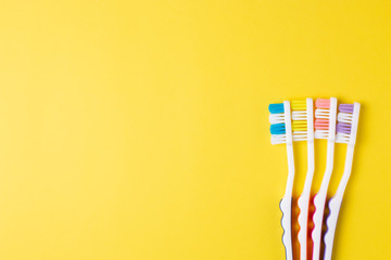 Toothbrush on the yellow background