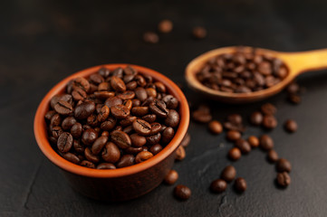 coffee beans on stone background, close-up