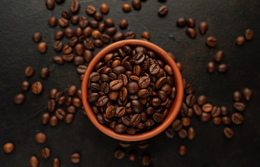 coffee beans on stone background, close-up