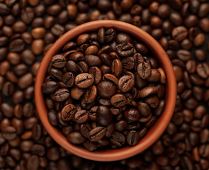 coffee beans on stone background, close-up