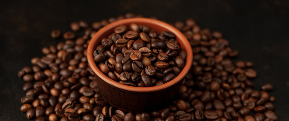 coffee beans on stone background, close-up